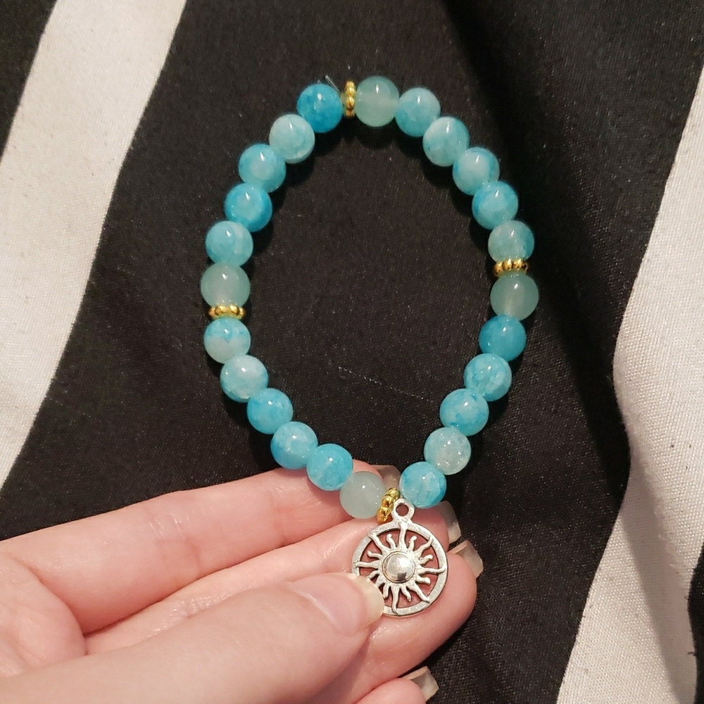 Blue Beaded Bracelet with Silver Charm